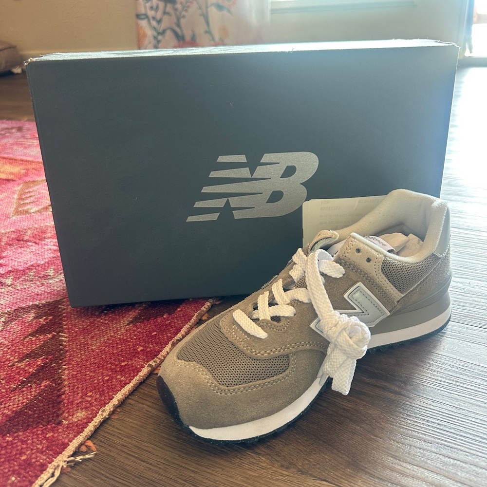 New Balance women’s 6  Grey and White Sneakers